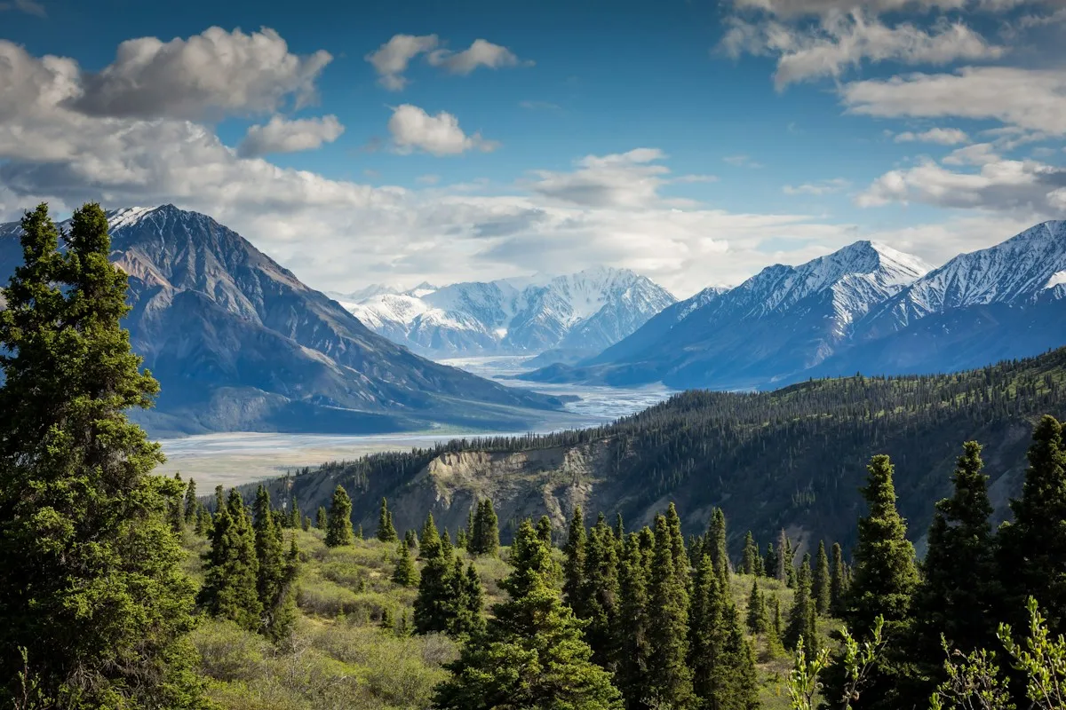 Mountain landscape opening toward a distant valley